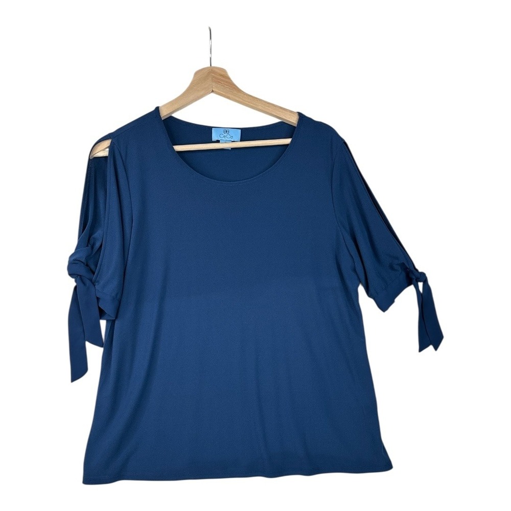 CeCe Short Sleeve Cut Out Sleeve size Medium Blue